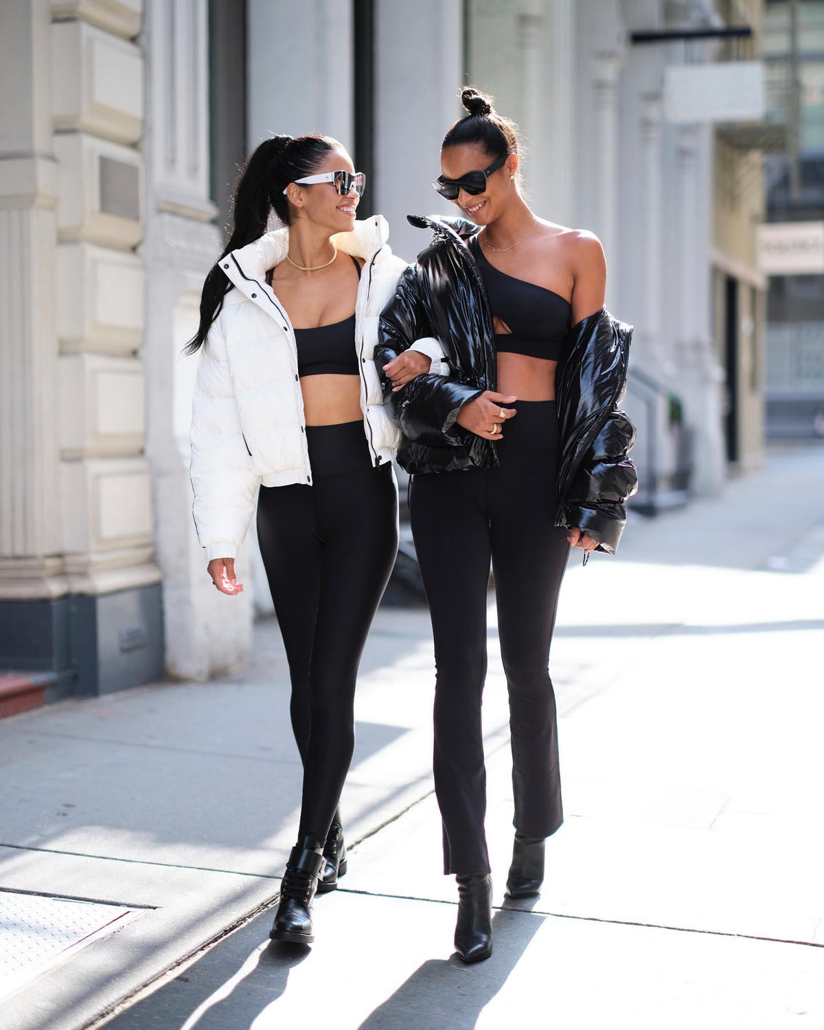 @daianesodre and @laisribeiro wearing head-to-toe Alo outfits while walking the streets of New York in between shows.